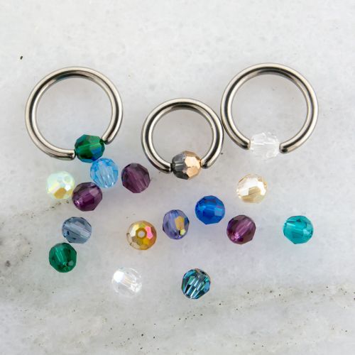 Multi faceted Round Captive Bead 4mm